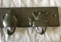 2 cabides (cozinha)
