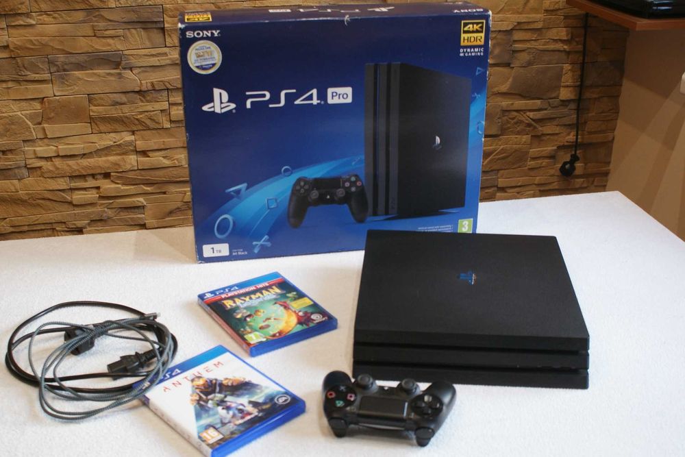 Konsola PS4 PRO 1TB pad gry Rayman Anthem stan IDEALNY kable