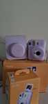 Instax mini 12, praticamente nova