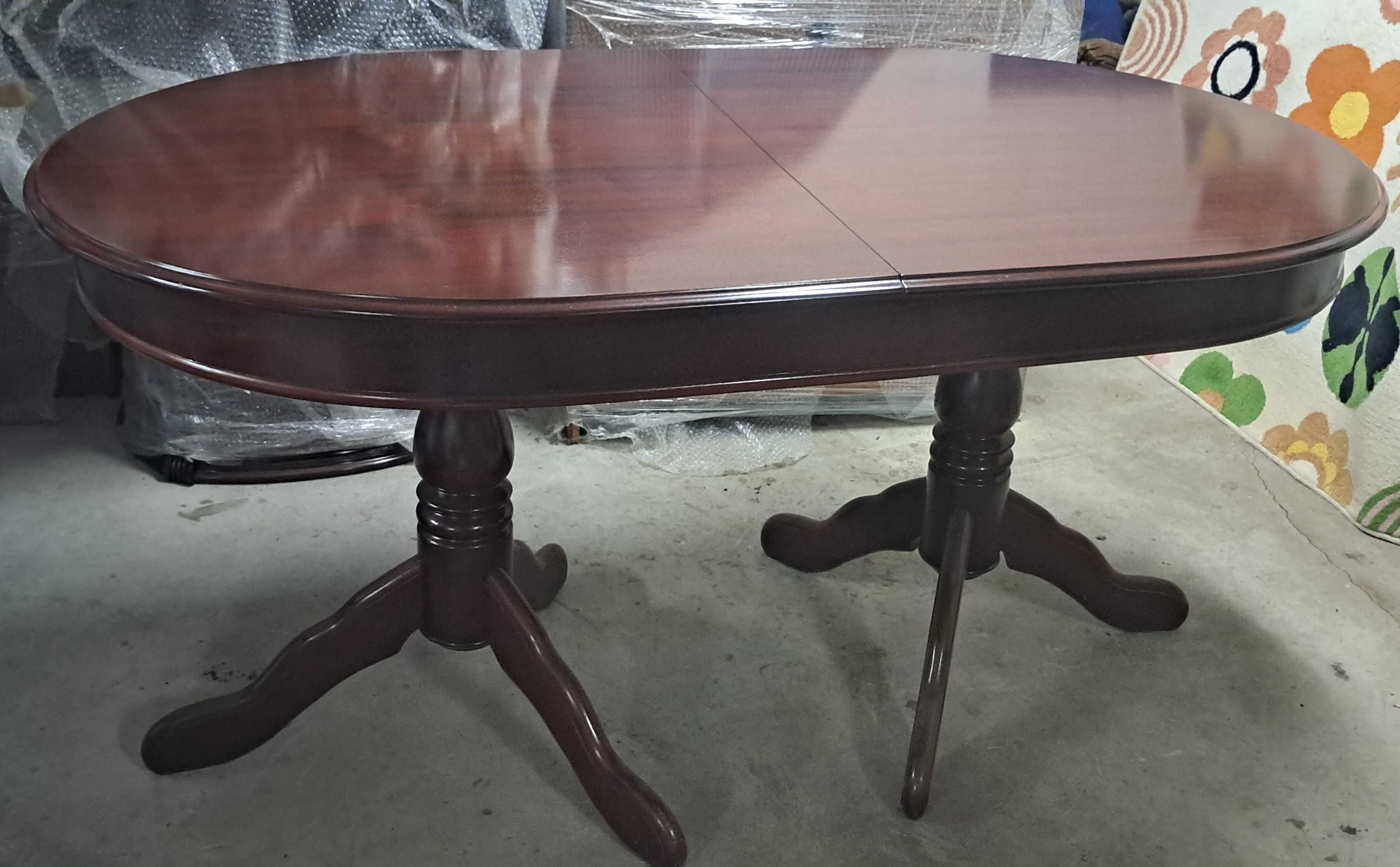 Mesa oval extensível de madeira