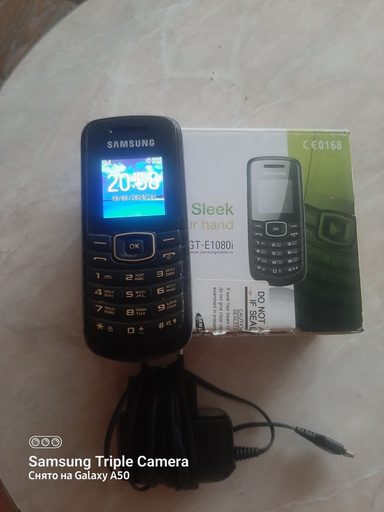 Телефон Samsung GT E1080W. Телефон  Siemens sx65.