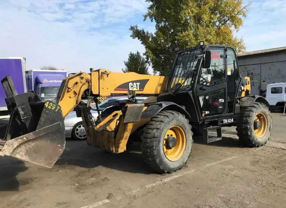 Телескопічний навантажувач Caterpillar TH414