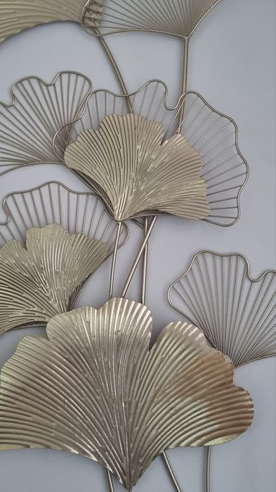 Quadro em metal dourado