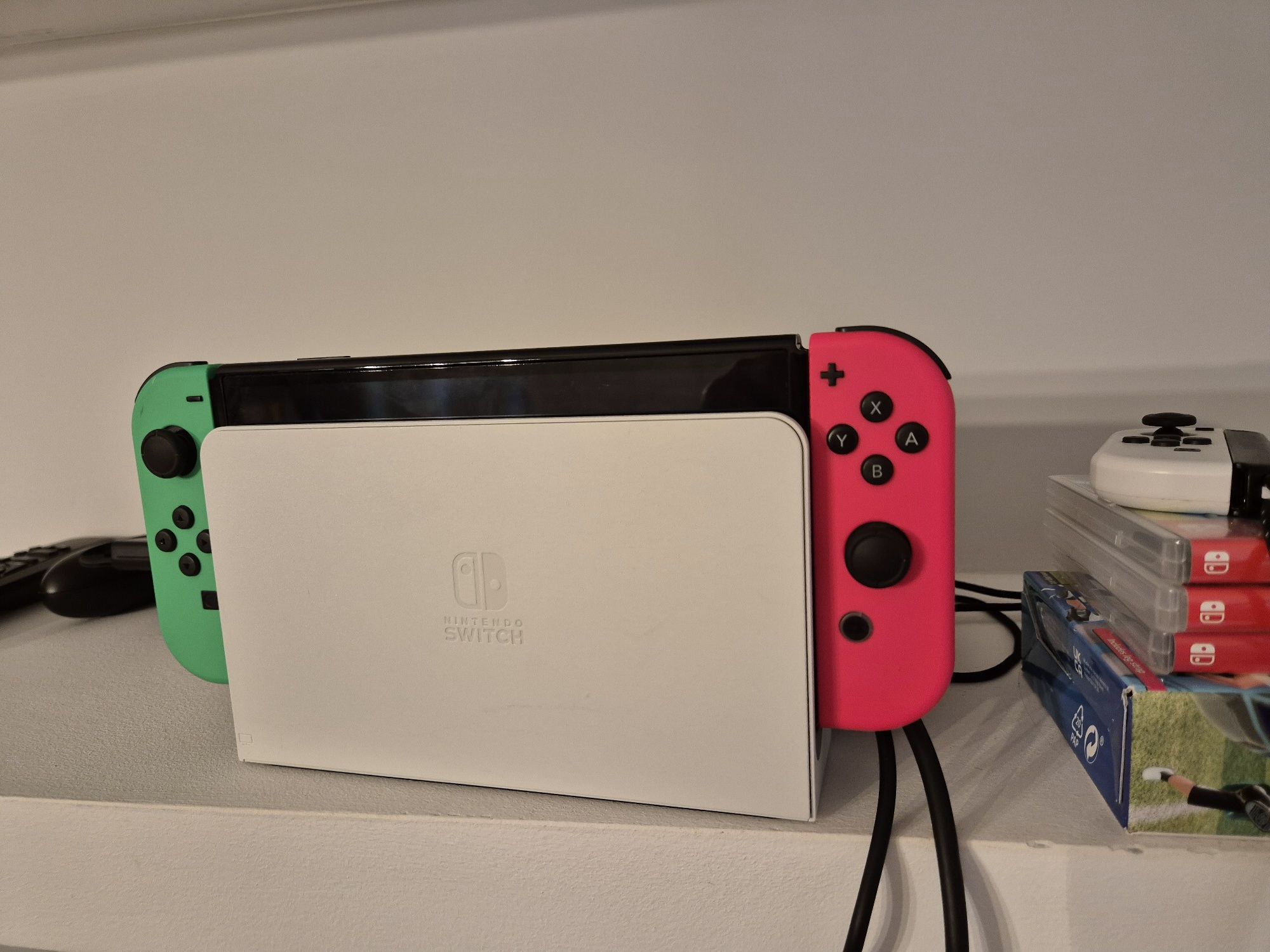Zestaw: Nintendo Switch OLED + gry i akcesoria (Zelda, sports, arms)
