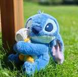 Peluche Stitch com patinho