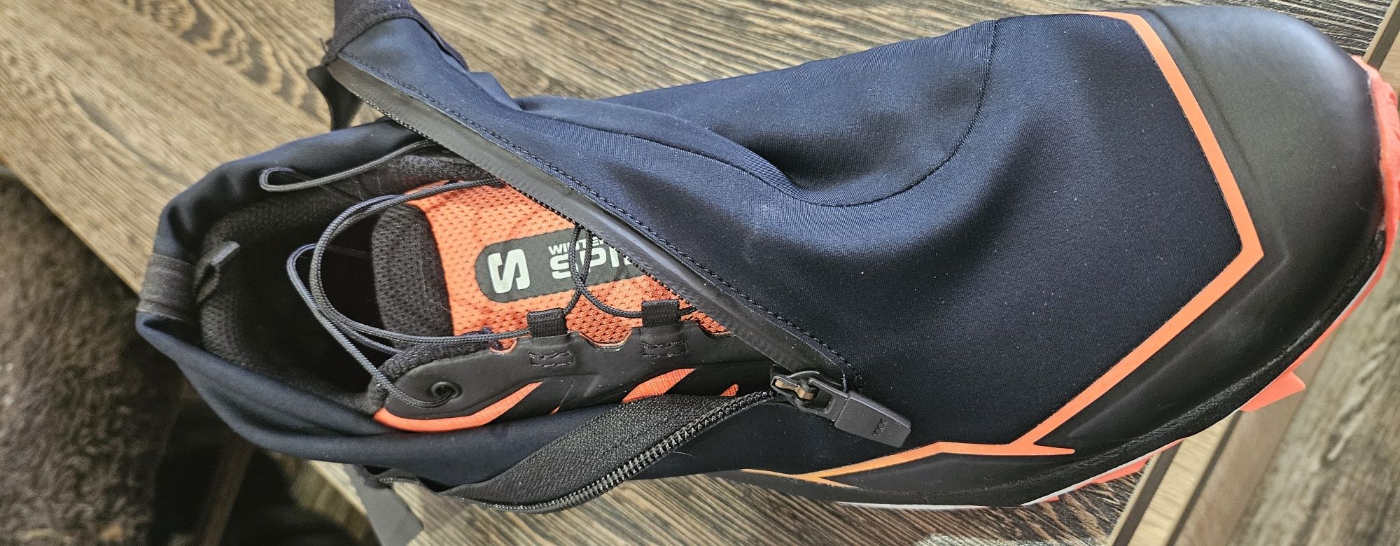 Продам бігові зимові кросівки Salomon