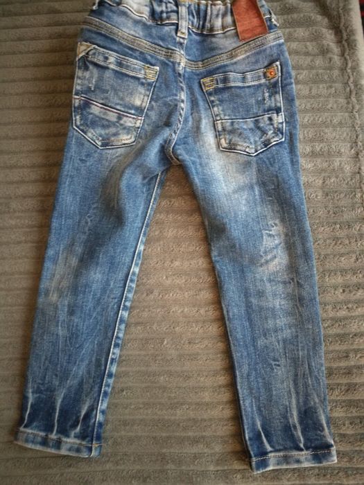 Spodnie jeansowe z dziurami Zara rozm. 104