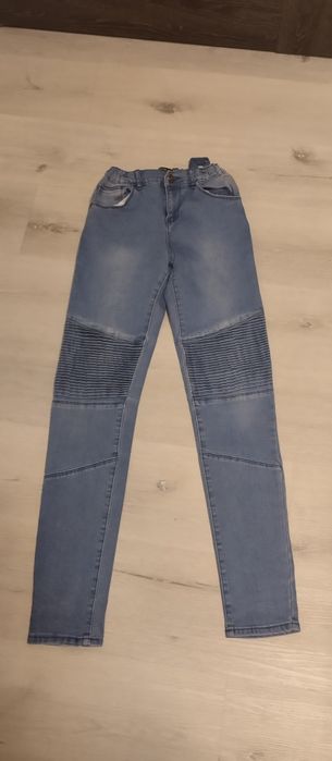 Jeansy damskie Reserved