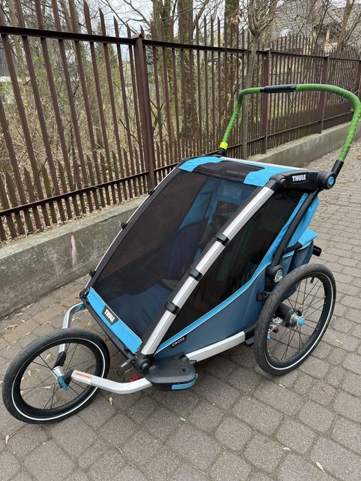 Przyczepa rowerowa thule cross 2 z zestawem biegowym oraz 1 śpiworem