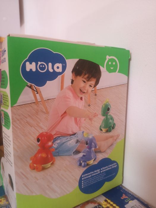 Каталка-динозаврик електронна Hola Toys музична 18х12 см з підсвічуван