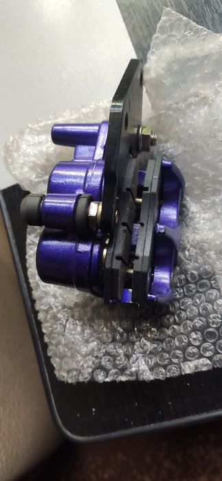 Суппорт тормозной (дисковый) 4Т GY6 50/150 (передний двух поршневой)