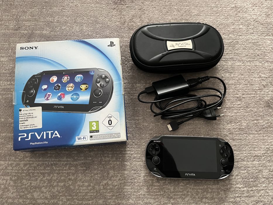 PS Vita com caixa original, 8 jogos e bolsa de transporte