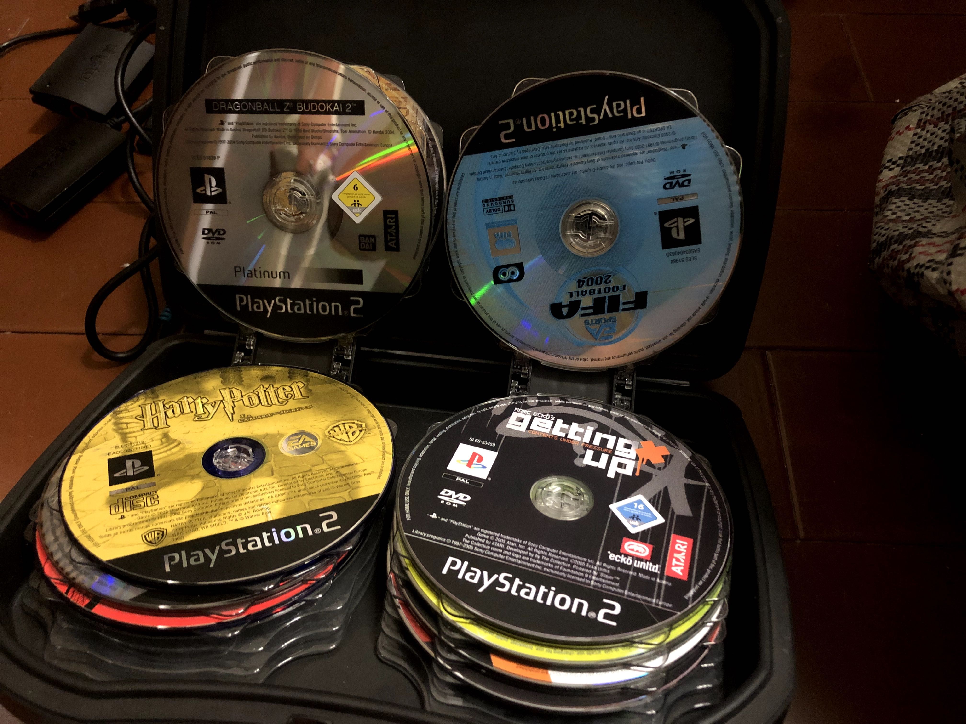 Playstation 2 + cartão memória/jogos/microfone singstar/câmara eye toy