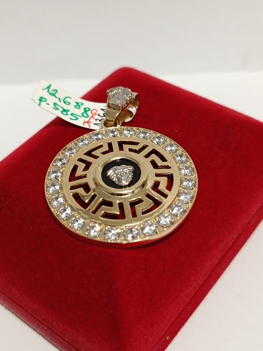Złoty wisiorek że wzorem greckim z cyrkoniami, złoto próby 585