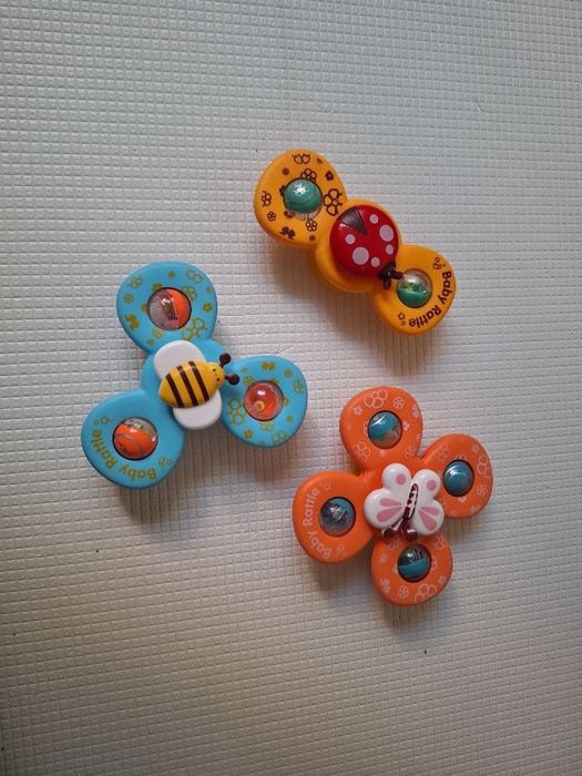 SPINNER Z PRZYSSAWKĄ - Zabawka sensoryczna