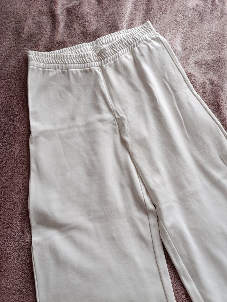 Reserved rozmiar L/XL 40/42 białe spodnie dresowe szerokie