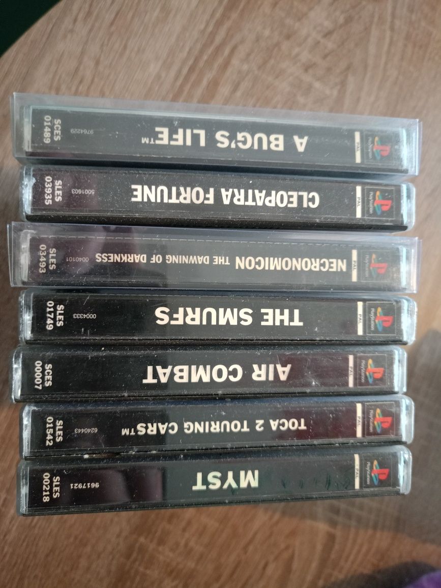 Zestaw gier PSX, the smurfs, necronomicon air combat Cleopatra's myst