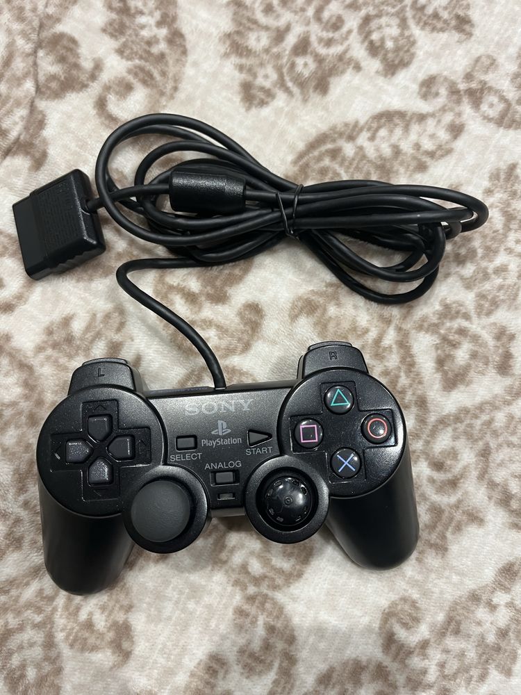 Comando PS2 com avaria