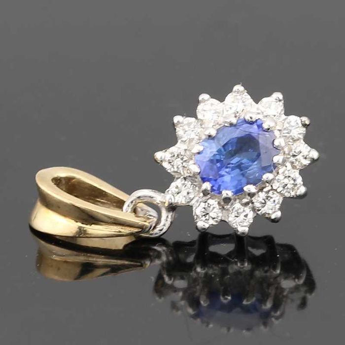 Złoty wisiorek z szafirem i diamentami 0.20ct 9K