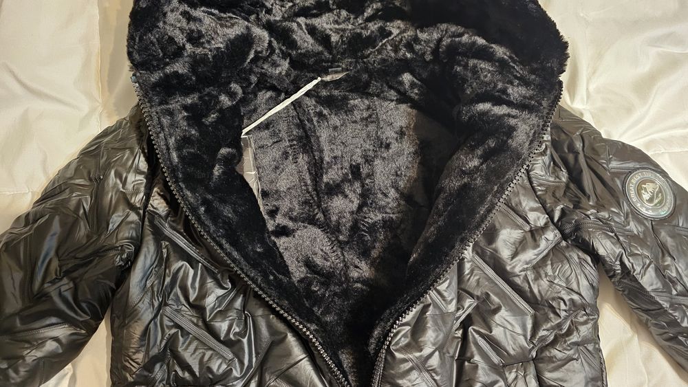 Kurtka znaczek na rękawie