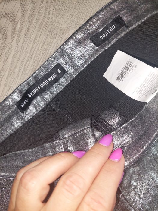 Srebrne jeansy damskie r.36 sinsay