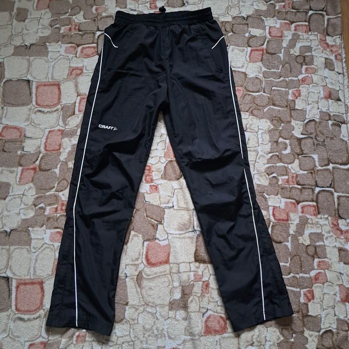 Spodnie Craft dresy ortalionowe sportowe treningowe 146/152