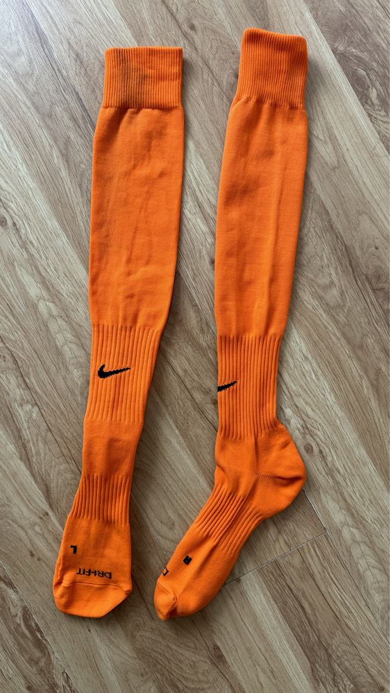 Długie getry piłkarskie Nike pomarańczowe