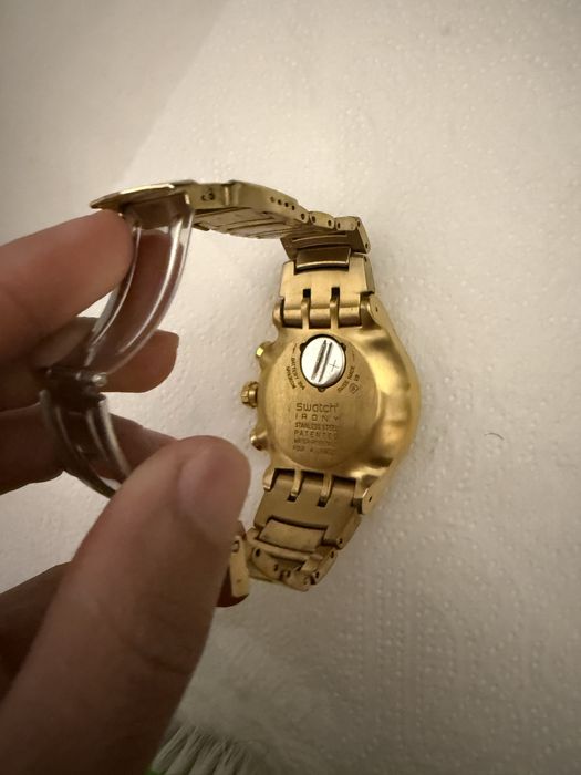 Religio swatch irony dourado