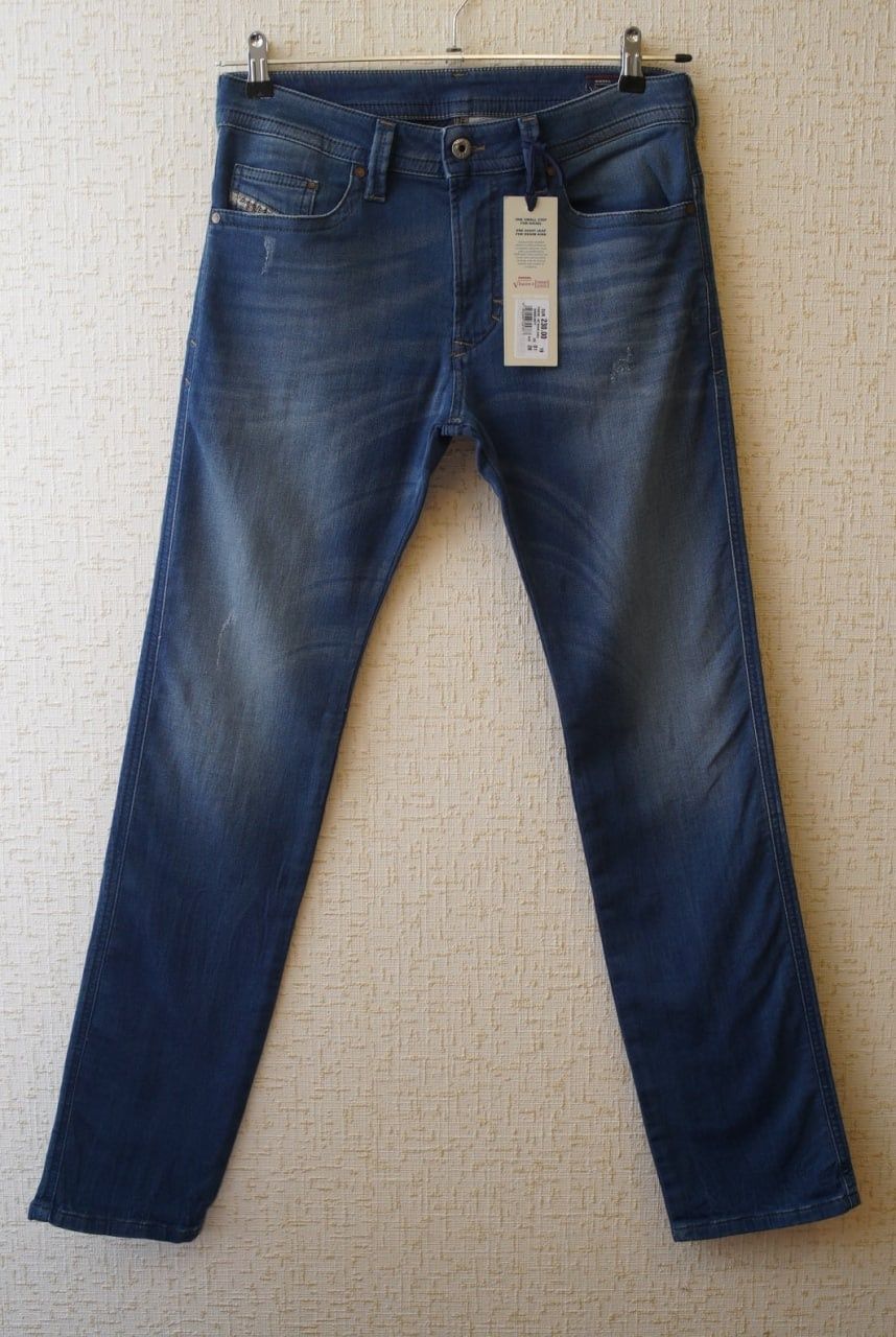 Джинсы DIESEL JoggJeans синего цвета (THAVAR-NE 0837T)