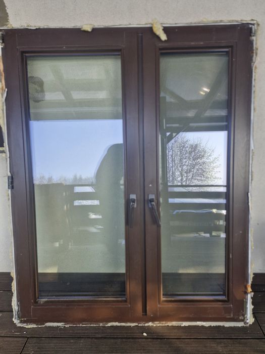 Okna  drewniane i plastikowe, drzwi tarasowe