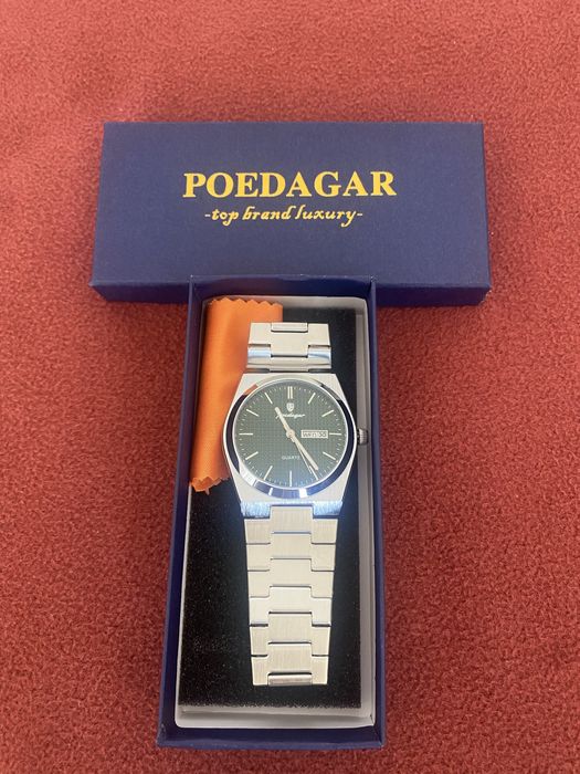 Relógio de quartzo poedagar prateado
