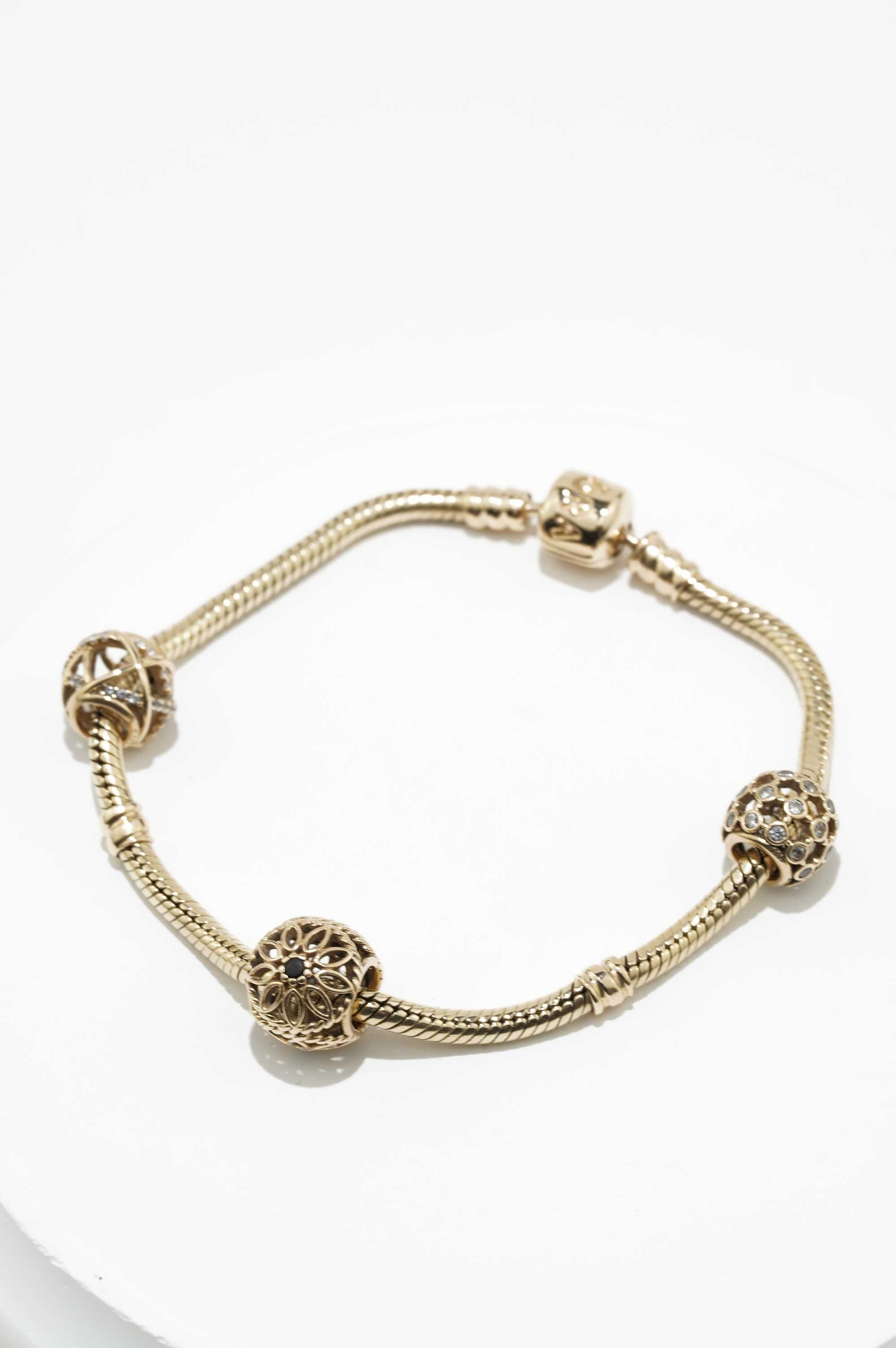 Złota bransoletka Pandora 14K 22,65g
