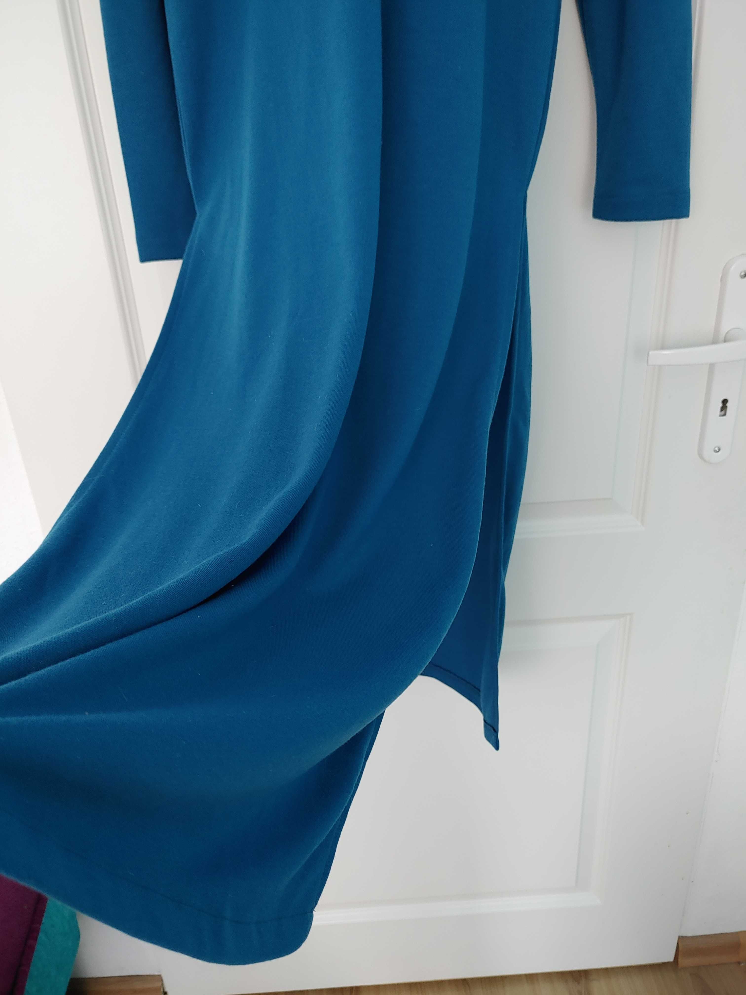 Niebieska lazurowa sukienka odkryte plecy głęboki rozporek długa midi