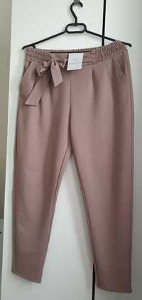 Eleganckie spodnie dresowe M-L