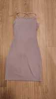 Fioletowa sukienka z wiązanymi plecami i wszytym body
