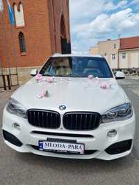 Białe Auto do ślubu BMW X5m samochód z kierowcą