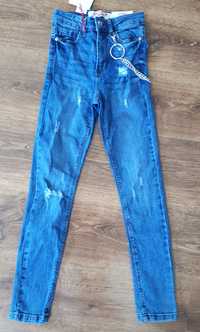 Spodnie dziewczęce jeansowe skinny 140/146