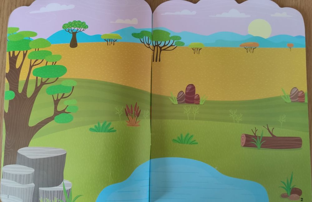 Розвиваюча книга "Граємо з наліпками. Тварини в птахи" 1+ рік