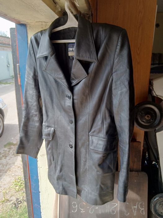 Продам черный кожаный пиджак .