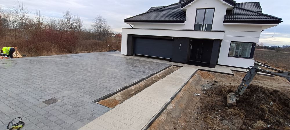 Układanie kostki brukowej brukarstwo odwodnienia równanie terenu