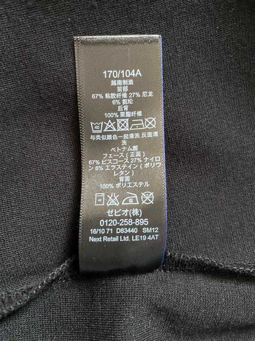 Next sukienka czarna dołem falbana duża 18 biurowa wizytowa