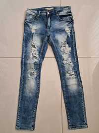 Spodnie jeansowe z dziurami  r. 38