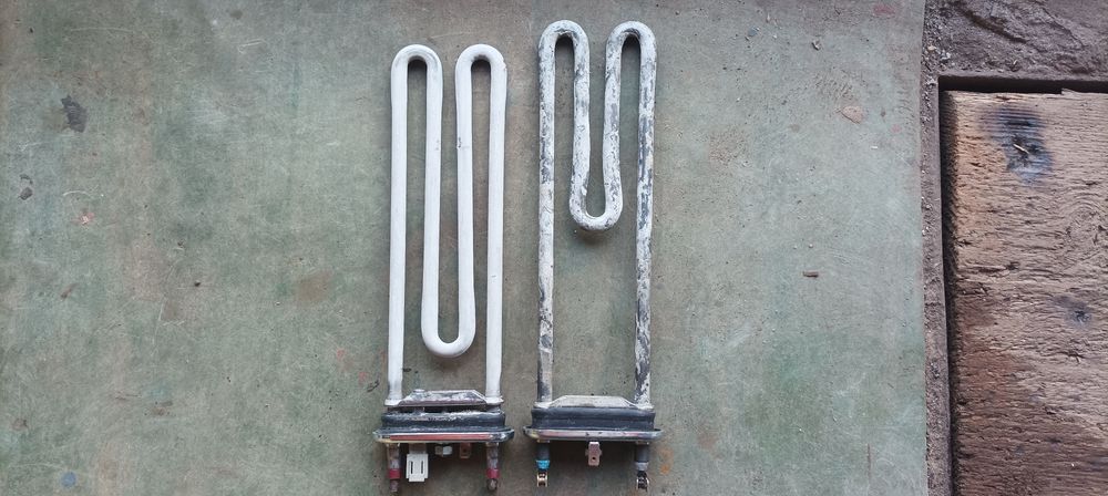 Electrolux Zanussi Aeg тен, замок люка, пресостат реле рівня води, тер