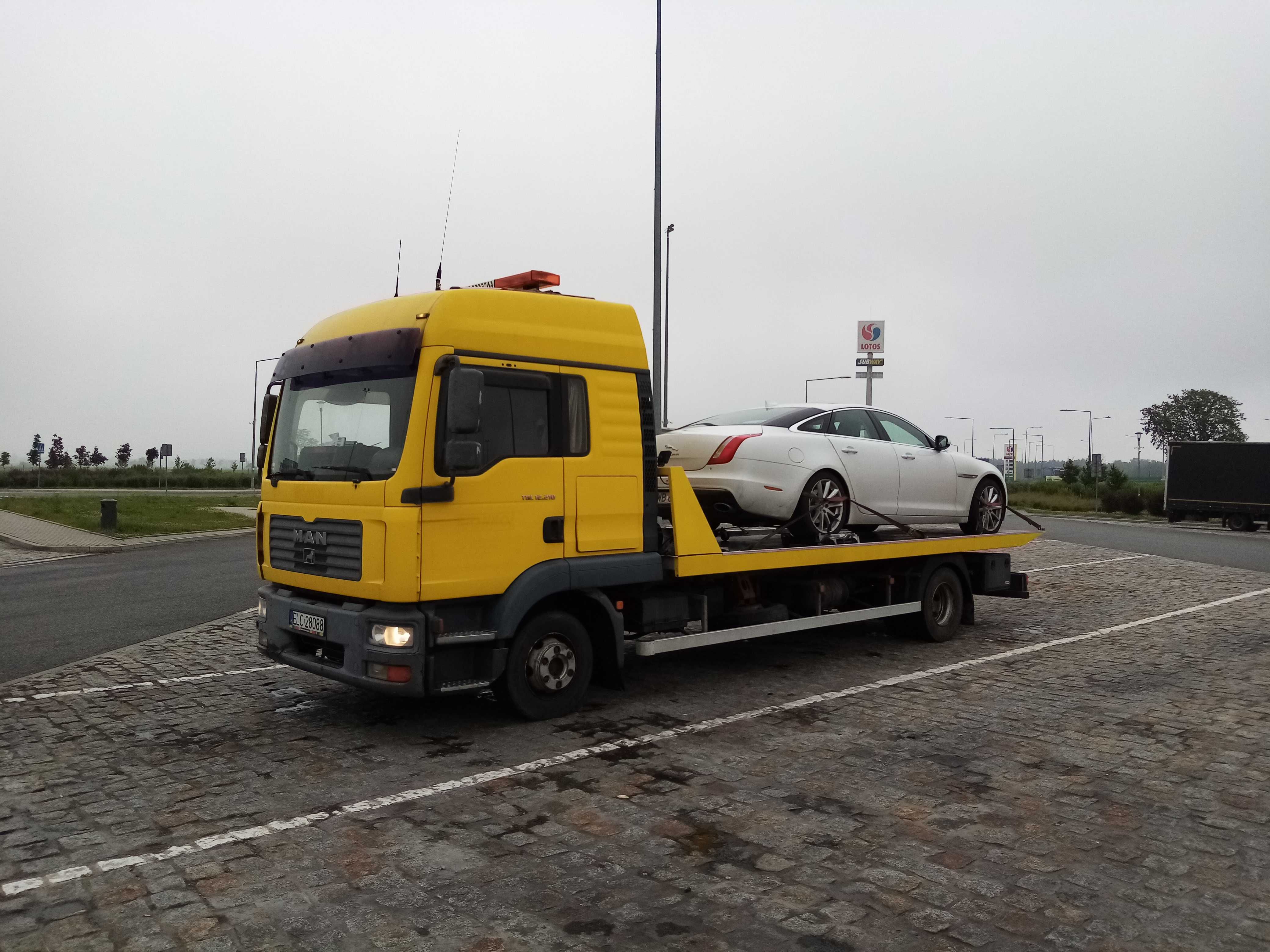 Pomoc drogowa, holowanie, transport, laweta, przewóz pojazdów
