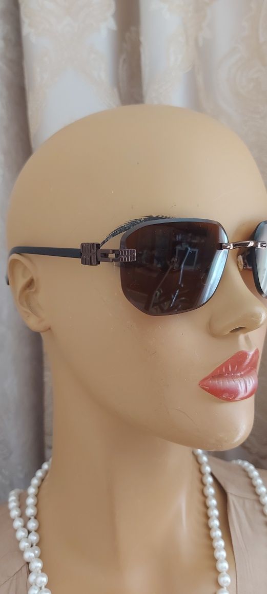 Сонцезахисні окуляри  miu miu