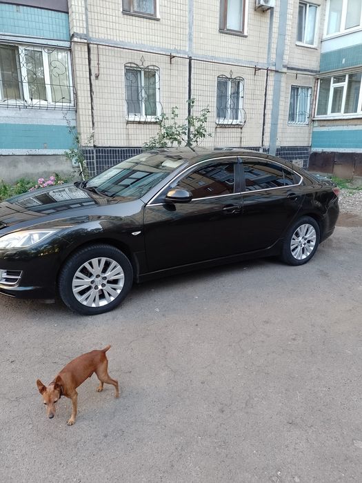 Мазда 6..газ-бензин..