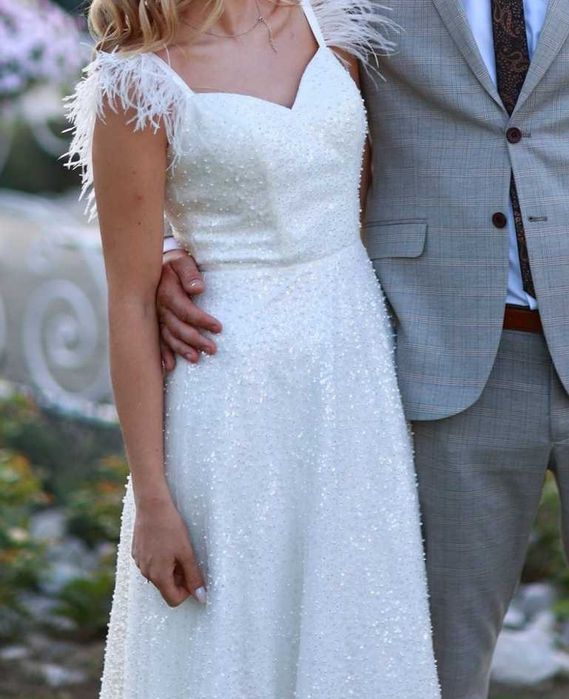 Suknia ślubna z piórami