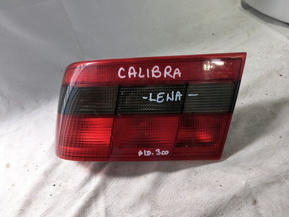 Lampa tylna lewa lewy tył opel calibra Europa igła