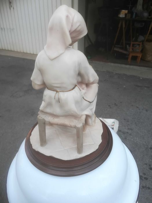 estatueta mãe rica em marfinite
