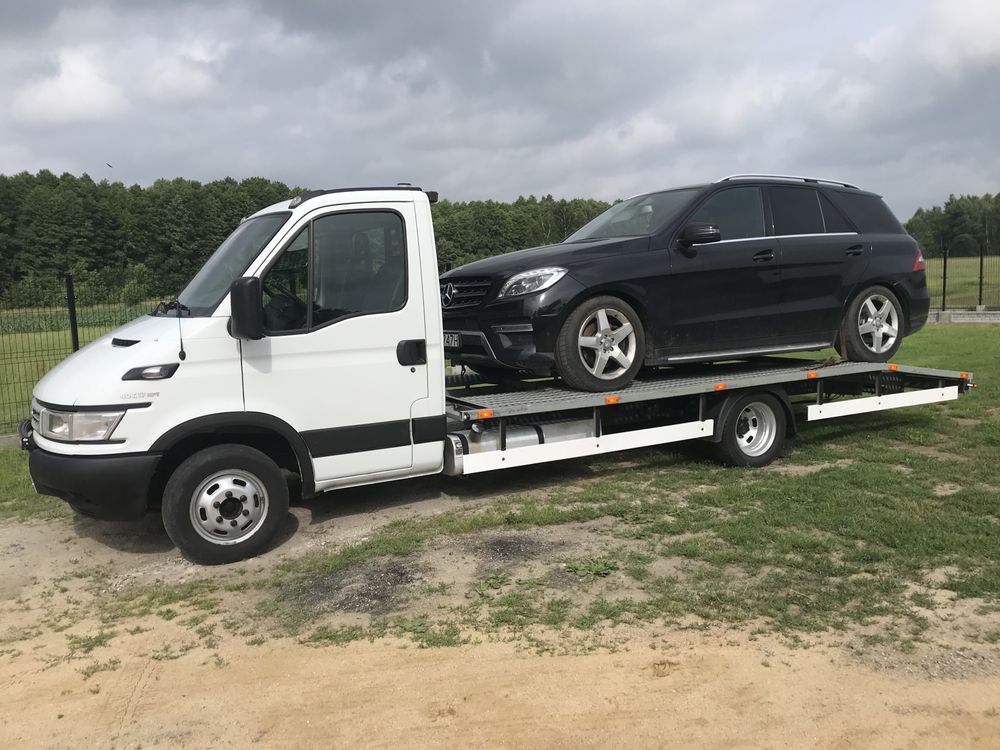 Pomoc drogowa 24h. Auto laweta. Transport